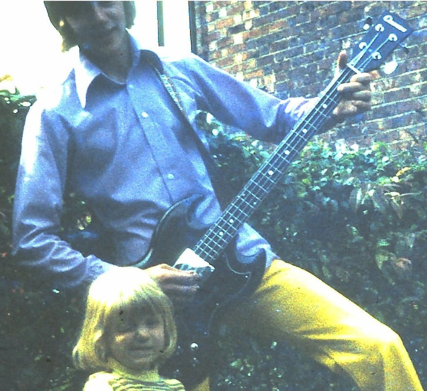 Young bass player with a Columbus EB3 copy bass guitar, reminiscent of early Gibson EB basses.