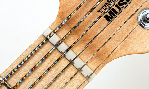 The compensated nut on a Music Man guitar