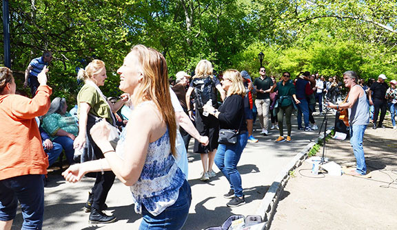 More dancing at &quot;Opening Day,&quot; emphasizing the interactive performance style