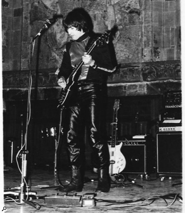 Paul White playing his Roland GR-500 guitar synth driving the Powertran Transcendent 2000 synth (far right).