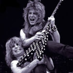 Randy Rhoads iconic Polka Dot Flying V guitar displayed on the cover of the Tribute album