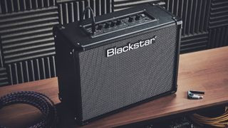Blackstar practice amplifier with guitar pedals and capo
