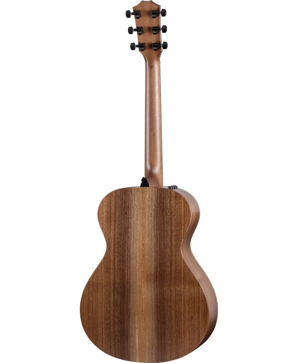 Taylor AD12e-SB grand concert acoustic guitar back view showing walnut wood grain.