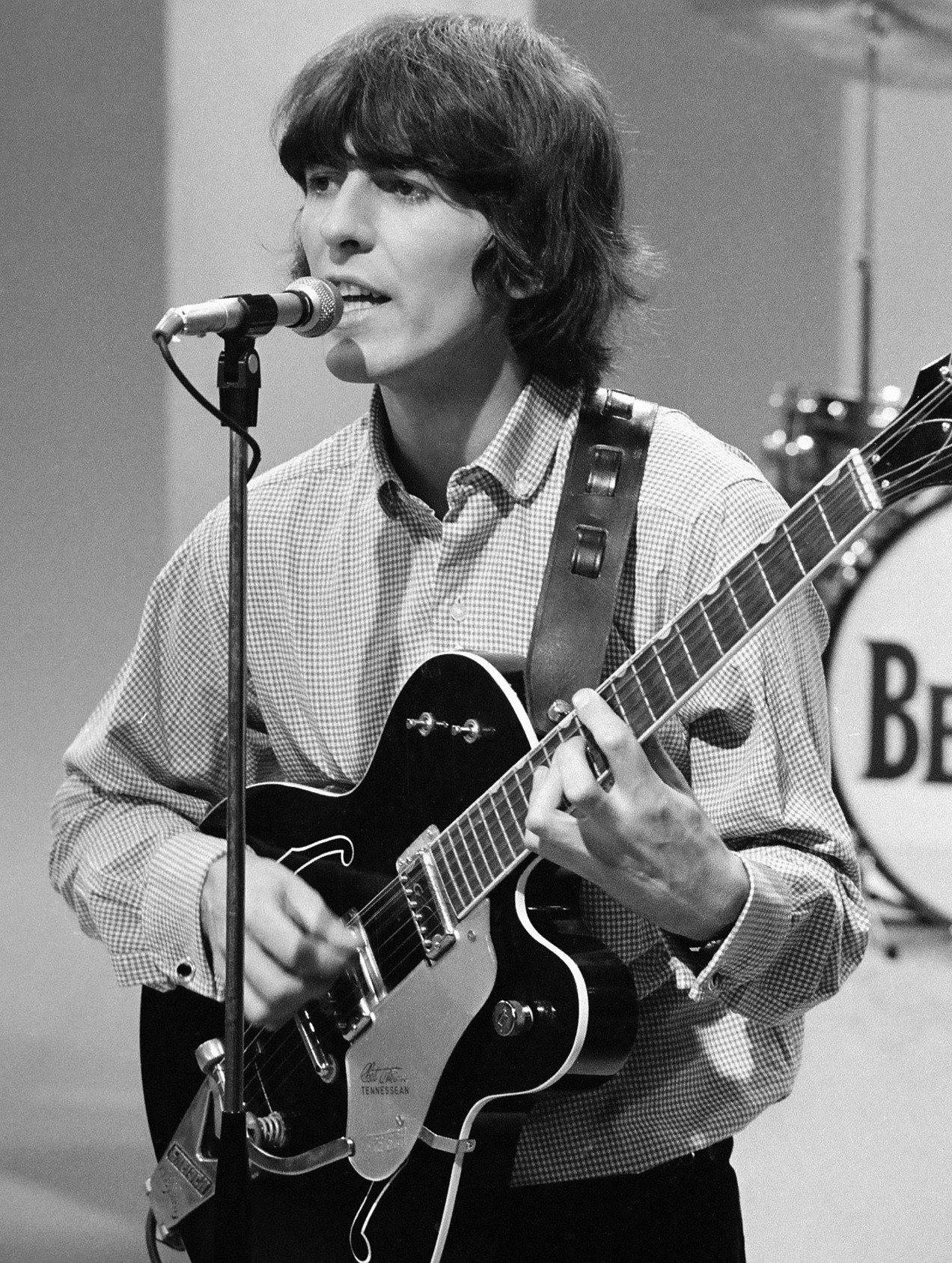 George Harrison playing his Gretsch Tennessean guitar