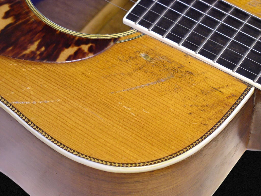 Close-up of the repair on the upper bout of Tony Rice's Martin D-28, a testament to its storied past
