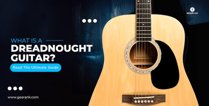 Close-up of a dreadnought acoustic guitar body, highlighting its iconic shape.