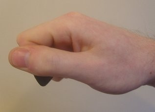 Fist Method Pick Hold 1