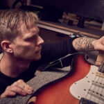 Guitar string height at the 12th fret