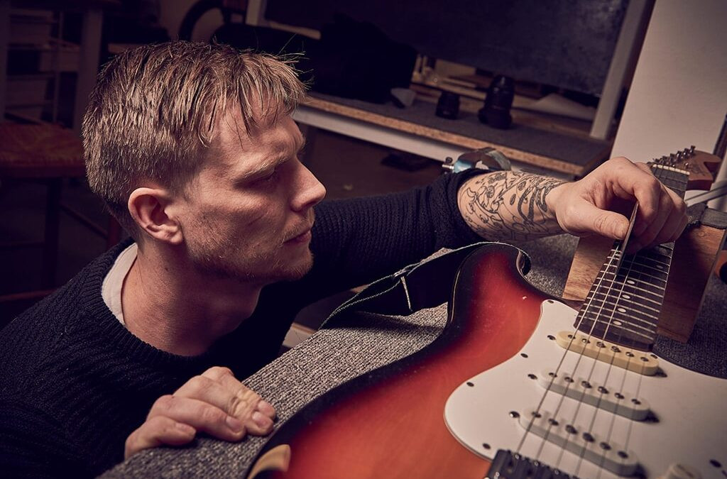 Guitar string height at the 12th fret