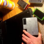 Velcro strips attached to the back of guitar effect pedals for secure mounting on a pedalboard
