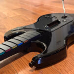 Guitar Hero Live gameplay featuring the six-button guitar controller