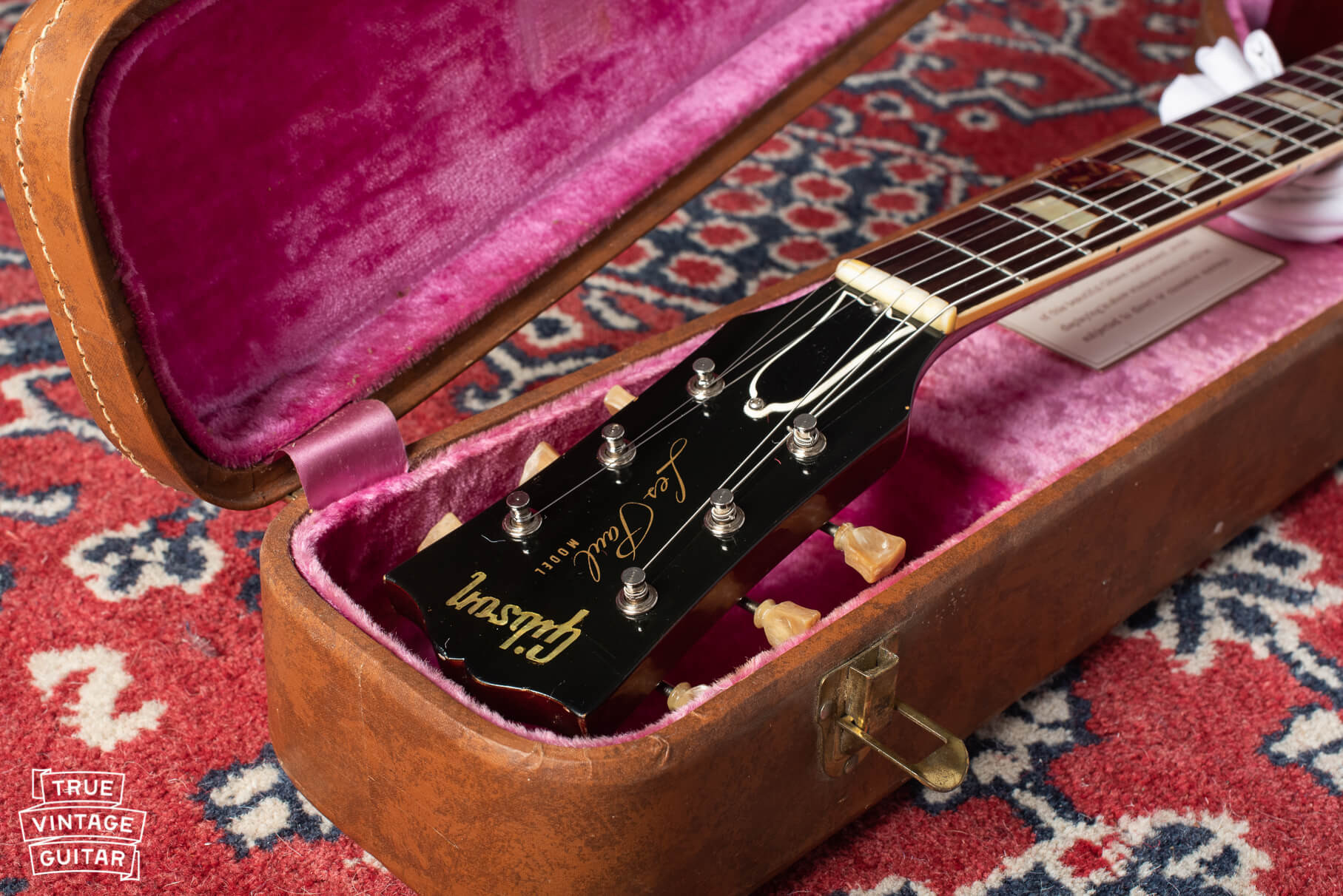 A collection of various Gibson Les Paul models, showcasing their distinct body shapes and finishes