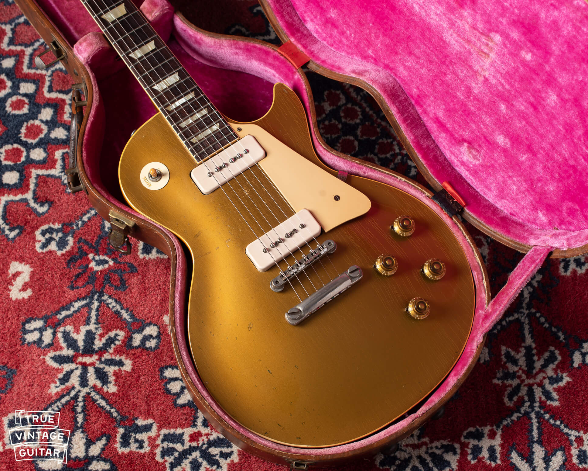 A vintage Gibson Les Paul Goldtop guitar, showcasing the iconic gold finish that influences its value