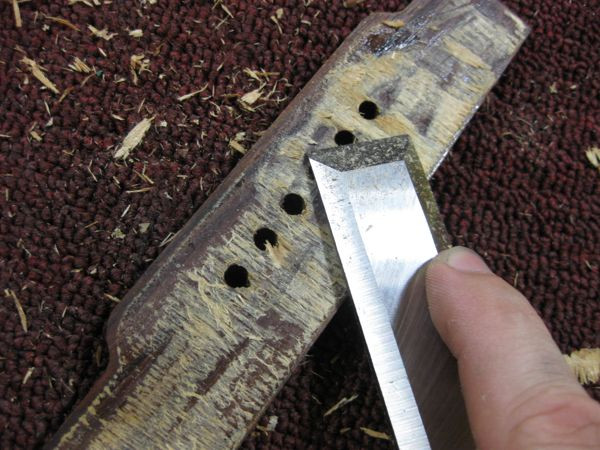 Removing excess wood and glue from the bridge