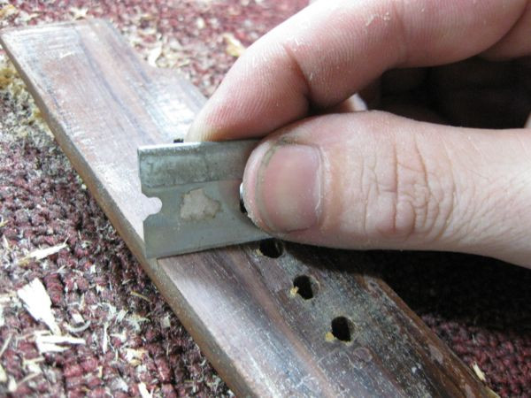 Sanding the bridge to match the flattened top