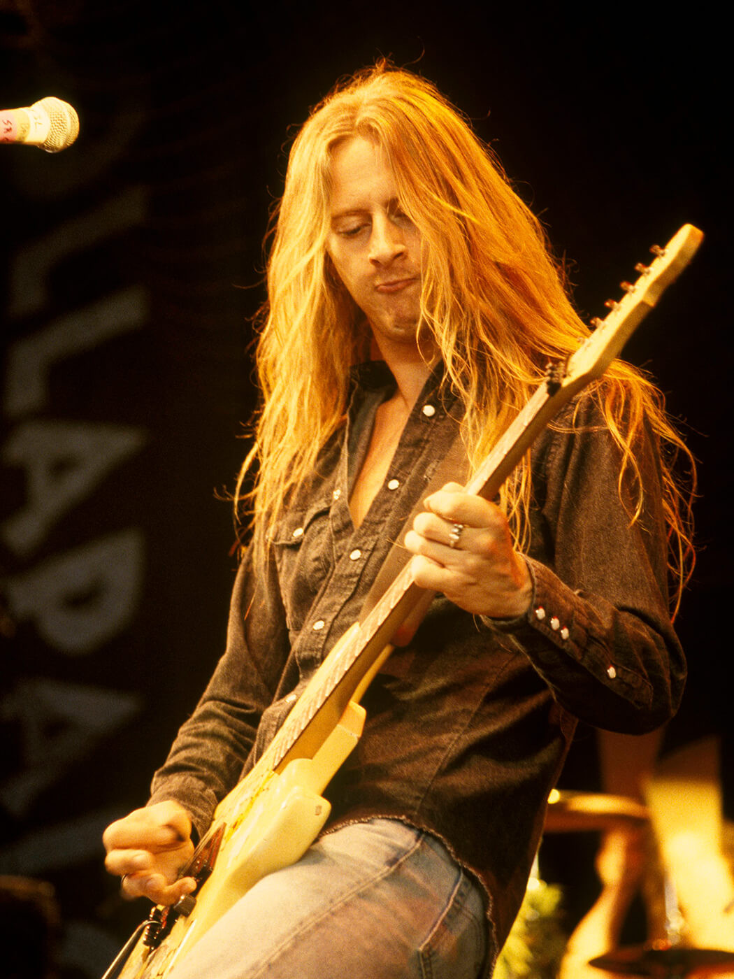 Alice in Chains performing live at Lollapalooza in 1993, showcasing their powerful stage presence and musical synergy