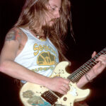 Jerry Cantrell performing with his signature "Blue Dress" G&L Rampage, showcasing its iconic modifications