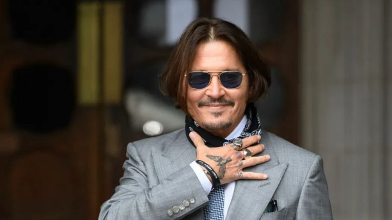 Johnny Depp playing guitar