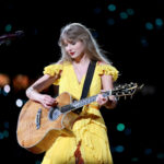 Taylor’s Taylor PS24, a Grand Auditorium acoustic guitar, features a flamed koa body with a distinctive matching soundhole cover and a ‘Taylor Swift’ in what Taylor calls a ‘Byzantine inlay’ on the fingerboard.