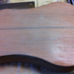 Sanding guitar body to prep for finishing